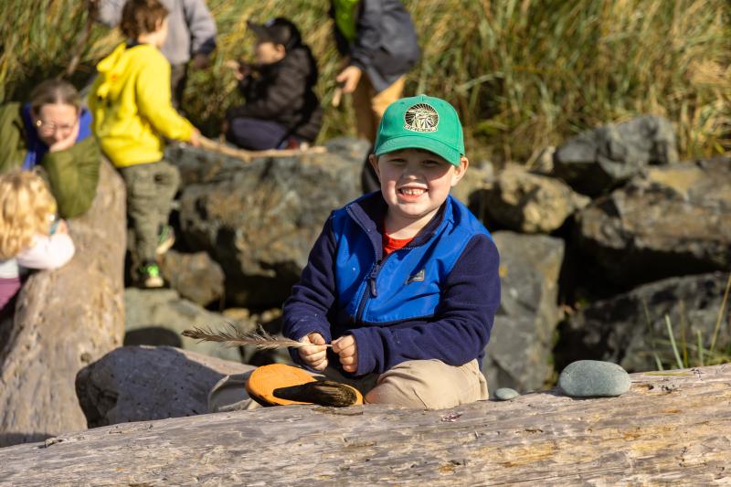 Picture of a kindergarten student on the beach.